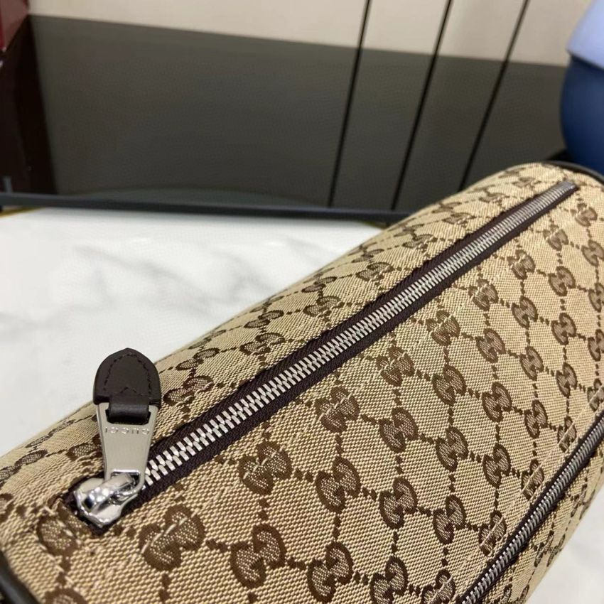 Gvc*1 GG Canvas Small Cylinder Bag