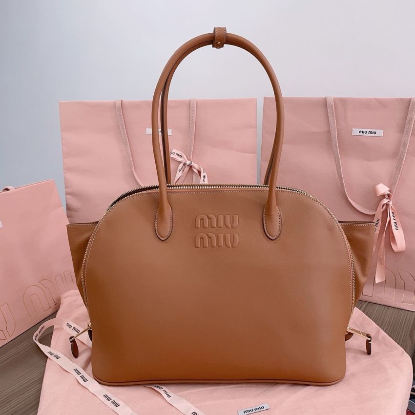 M1v M1v top handle leather bag