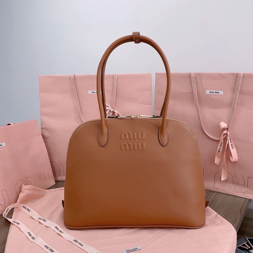 M1v M1v top handle leather bag