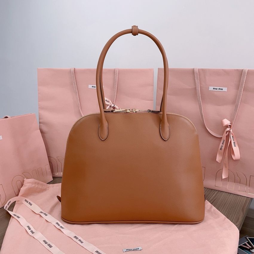 M1v M1v top handle leather bag