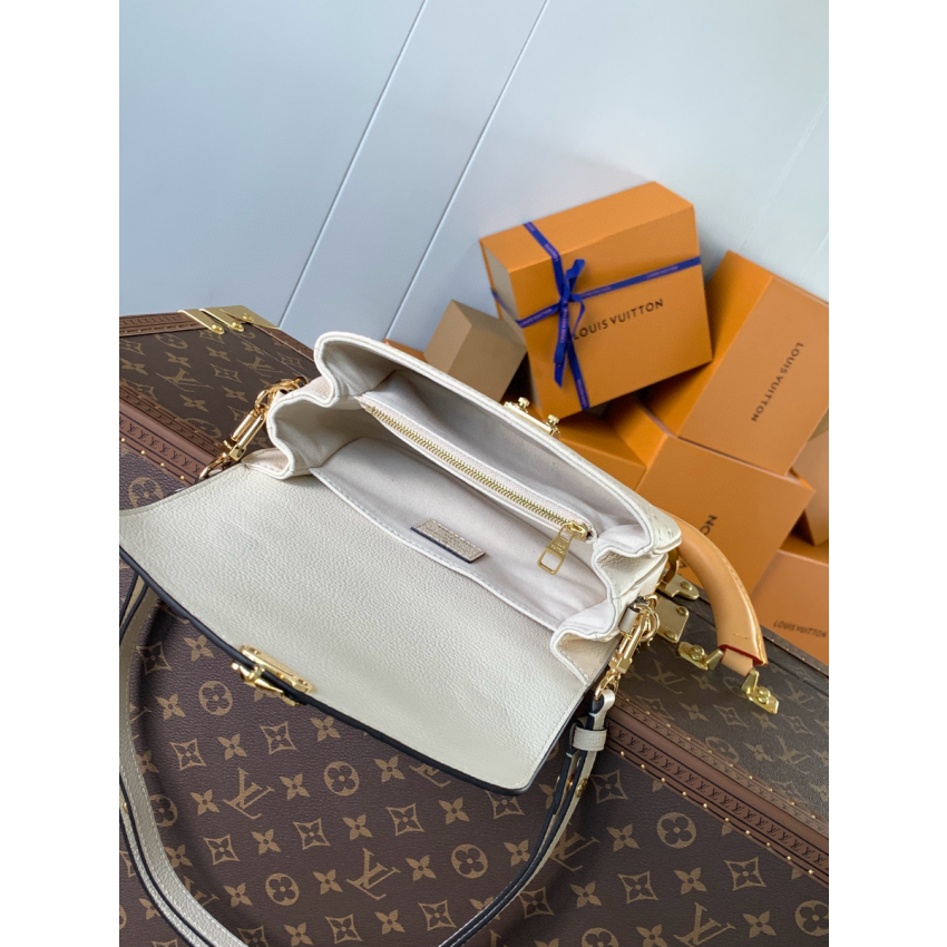 M22942 Pochette Métis East West