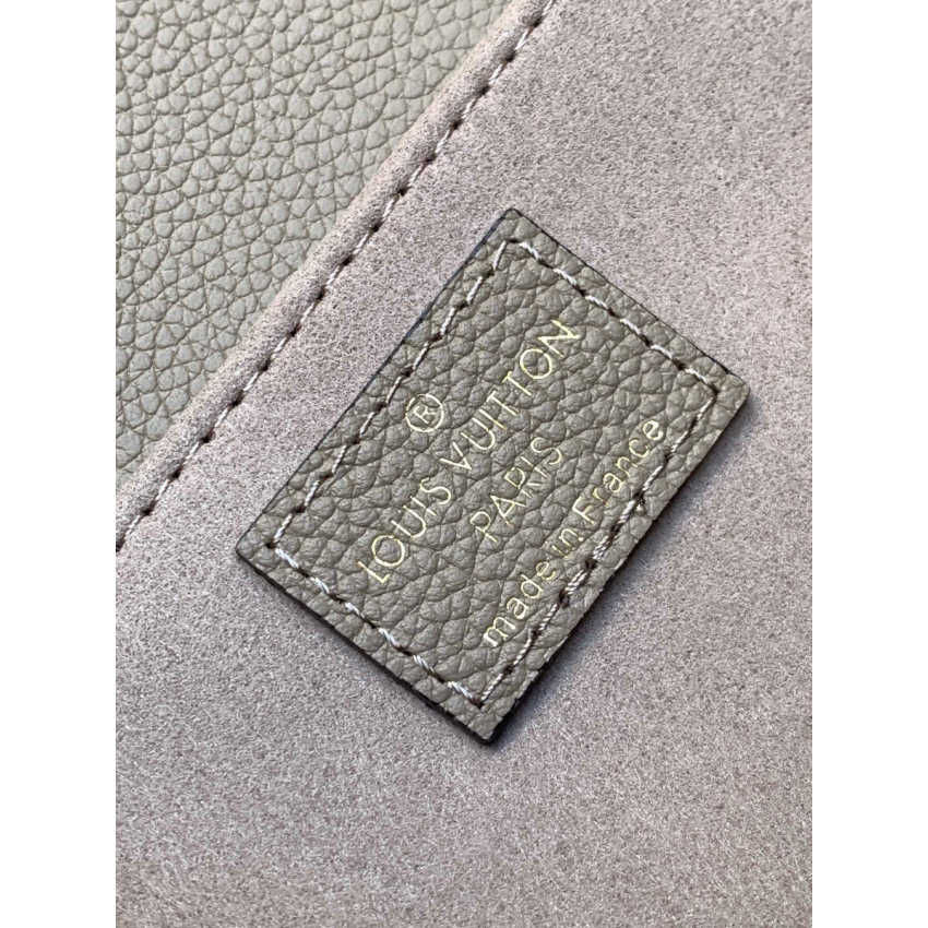 M23081Pochette Métis East West