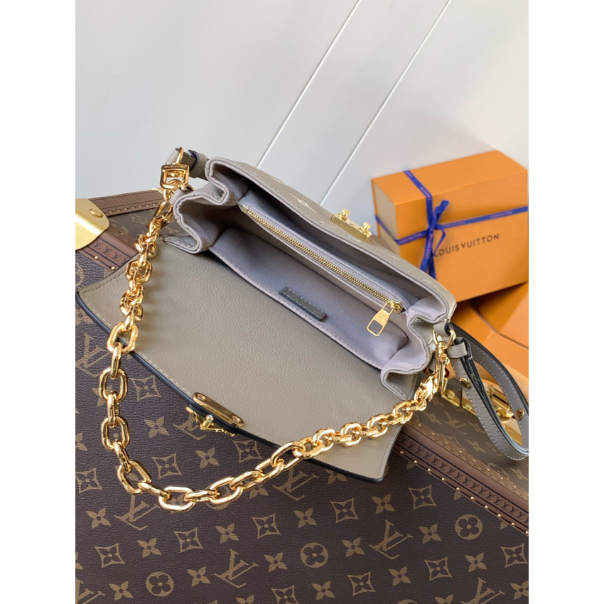 M23081Pochette Métis East West