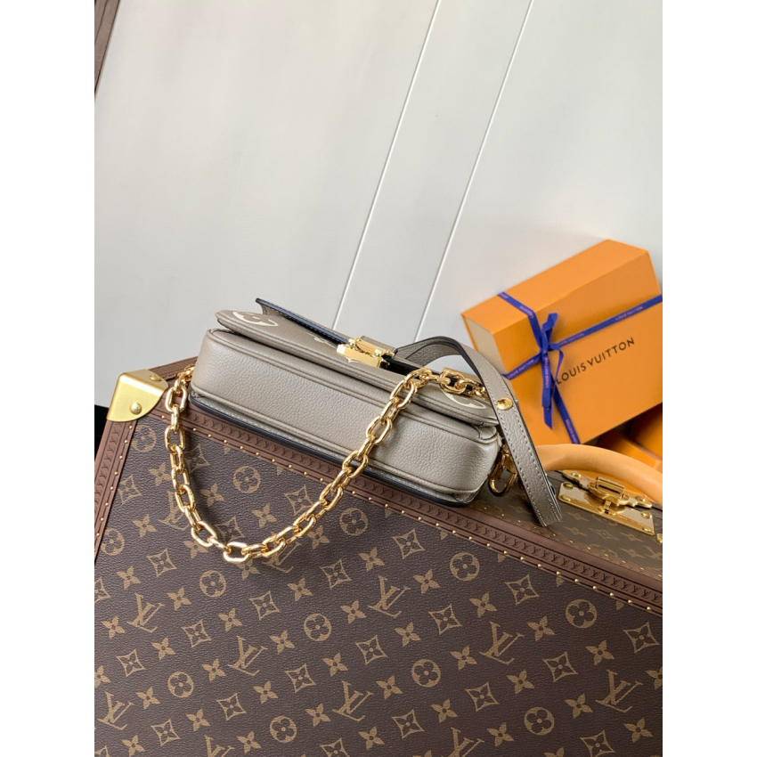 M23081Pochette Métis East West