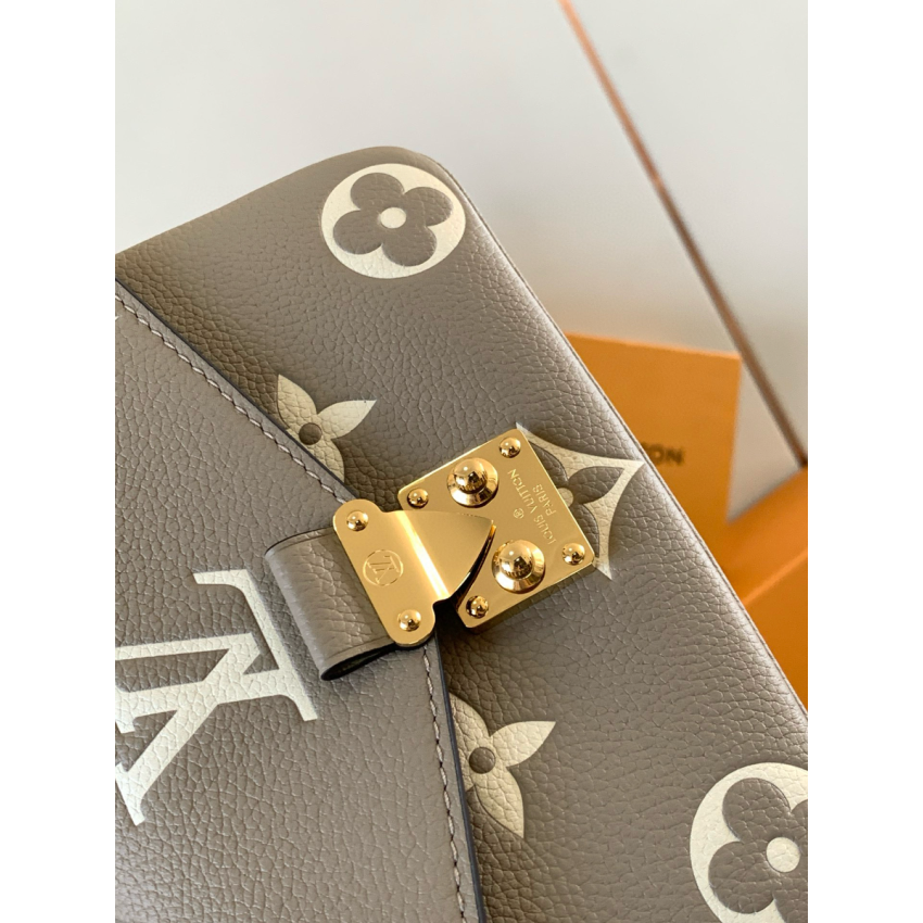 M23081Pochette Métis East West