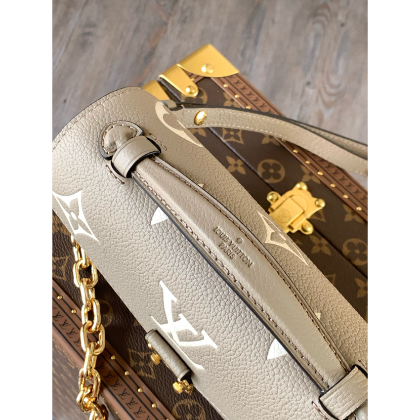M23081Pochette Métis East West