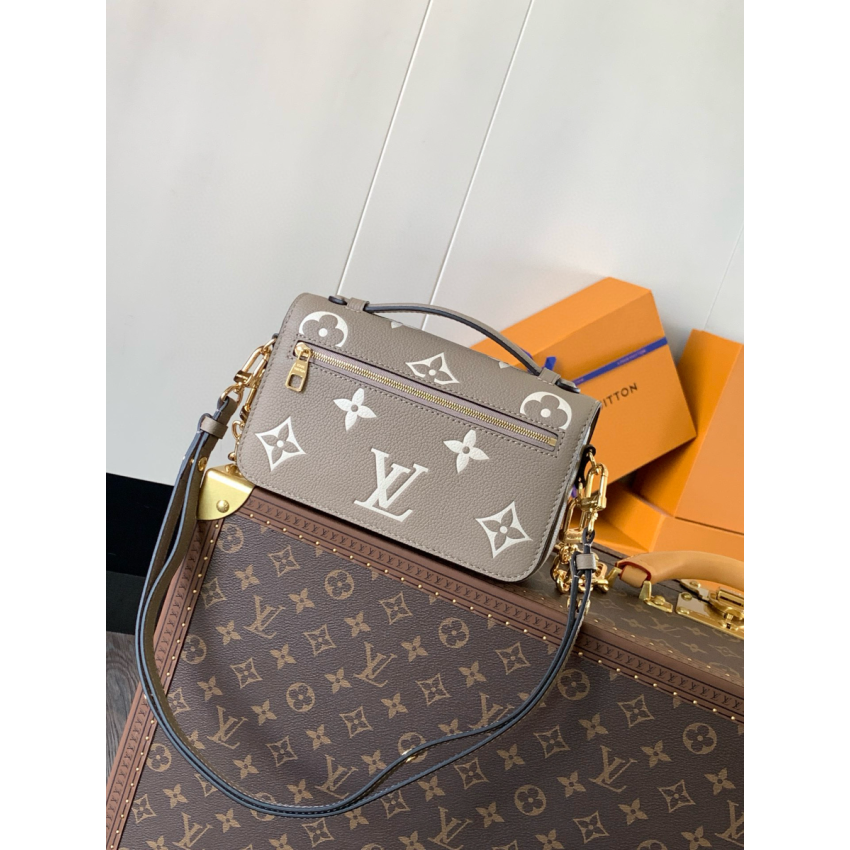 M23081Pochette Métis East West