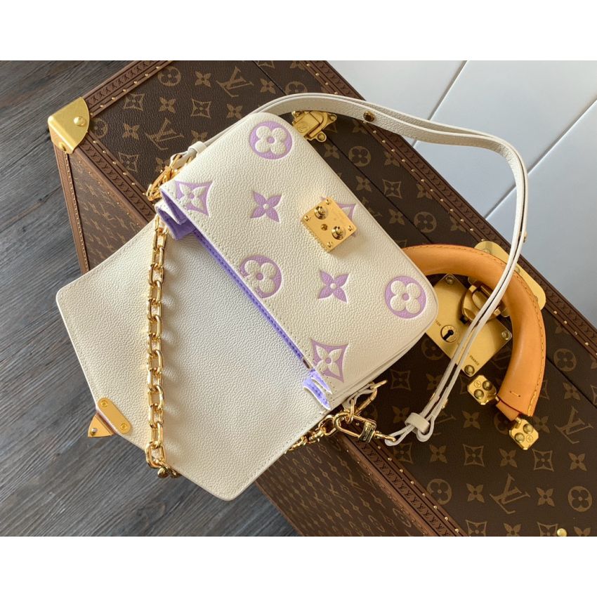 M23940 Pochette Métis East West