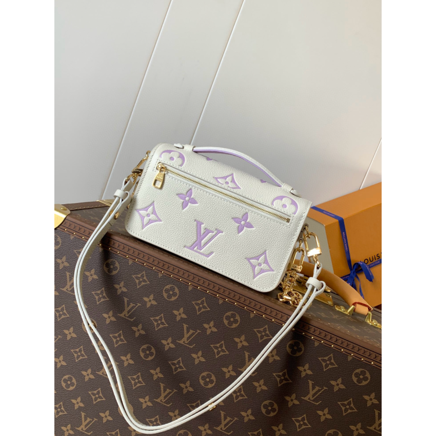 M23940 Pochette Métis East West