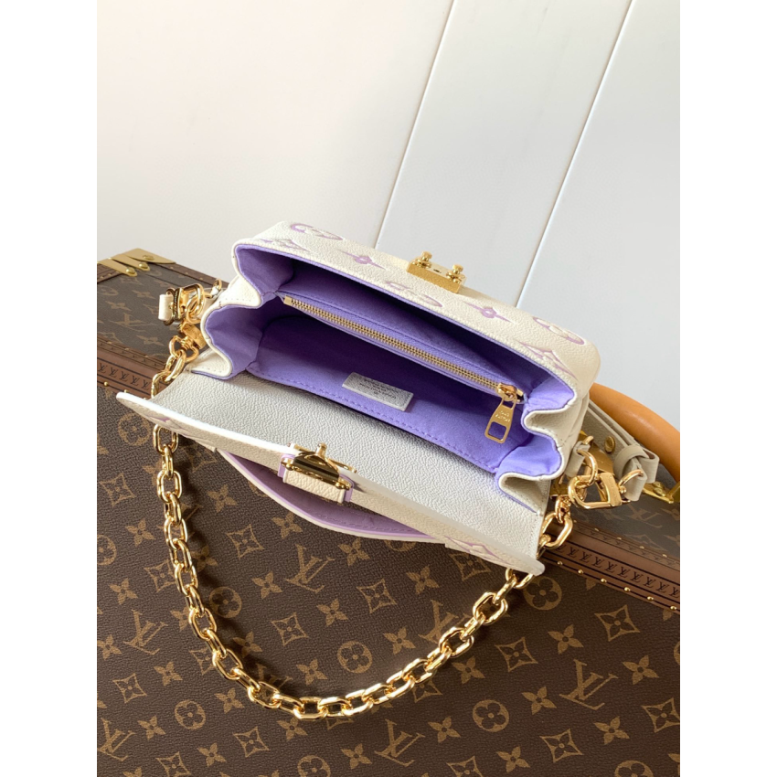 M23940 Pochette Métis East West