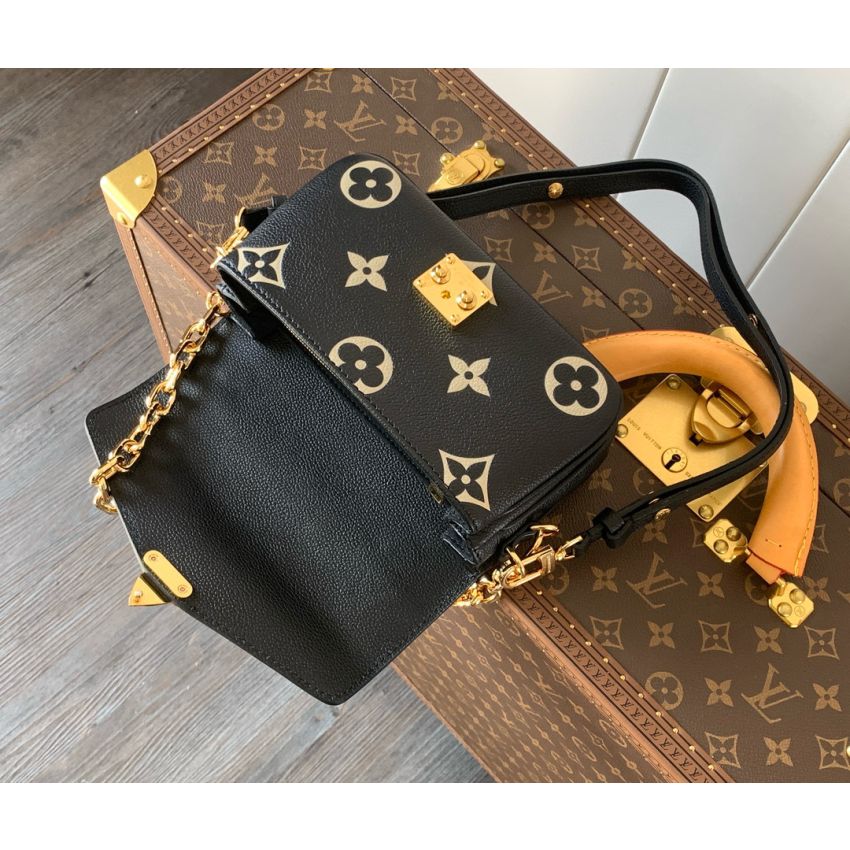 M46596 Pochette Métis East West