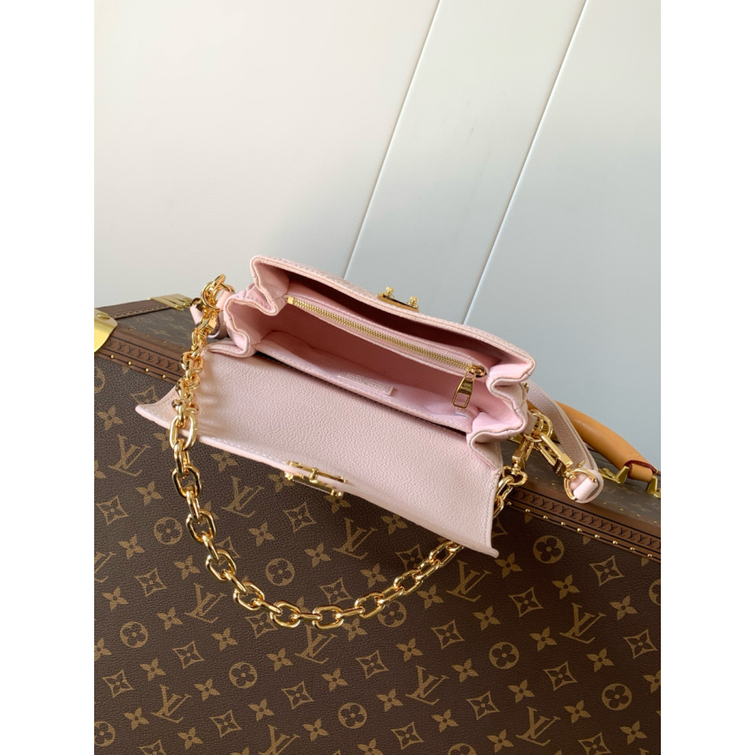 M47045 Pochette Métis East West